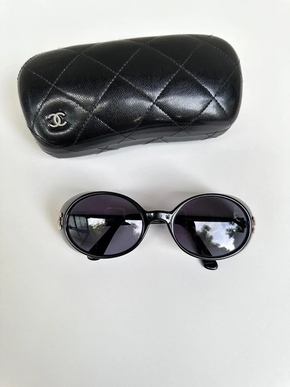 CHANEL Vintage 1990’s Oval Black Sunglasses with Gold CC Emblem